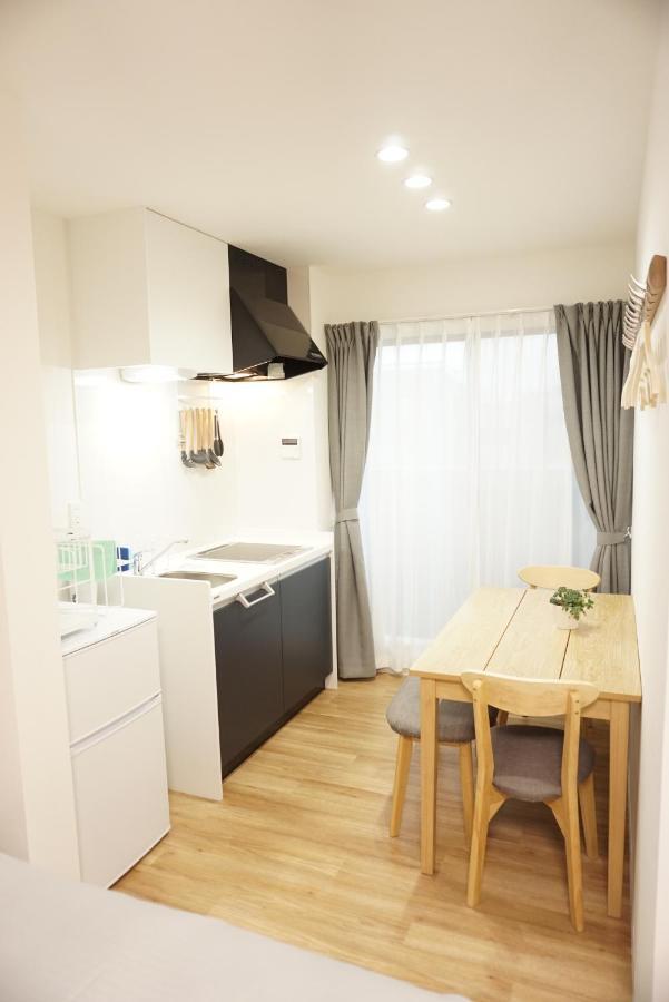 Sakura Shigure Shin-Osaka Apartment Bagian luar foto