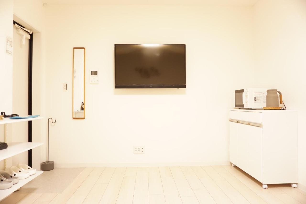 Sakura Shigure Shin-Osaka Apartment Bagian luar foto