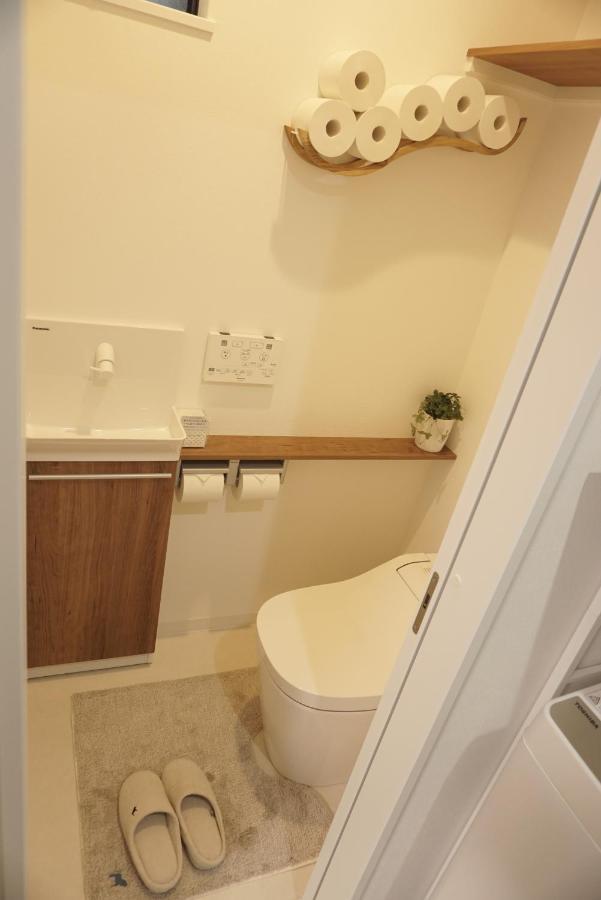 Sakura Shigure Shin-Osaka Apartment Bagian luar foto