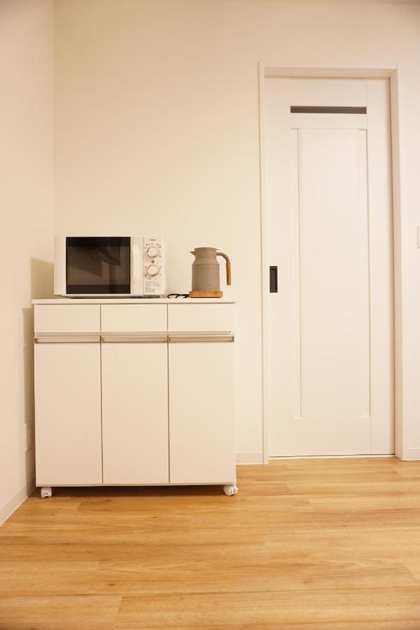 Sakura Shigure Shin-Osaka Apartment Bagian luar foto