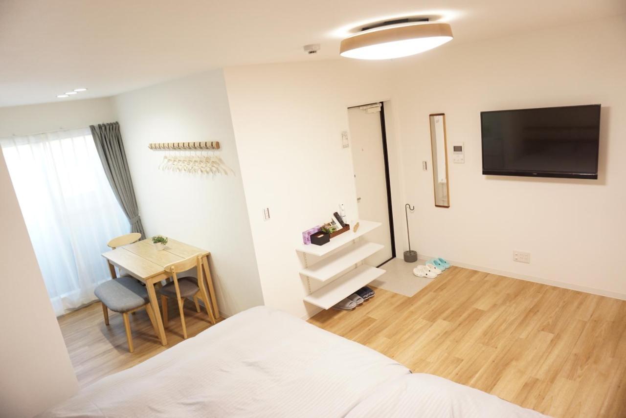 Sakura Shigure Shin-Osaka Apartment Bagian luar foto