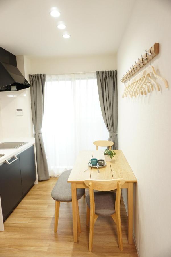 Sakura Shigure Shin-Osaka Apartment Bagian luar foto