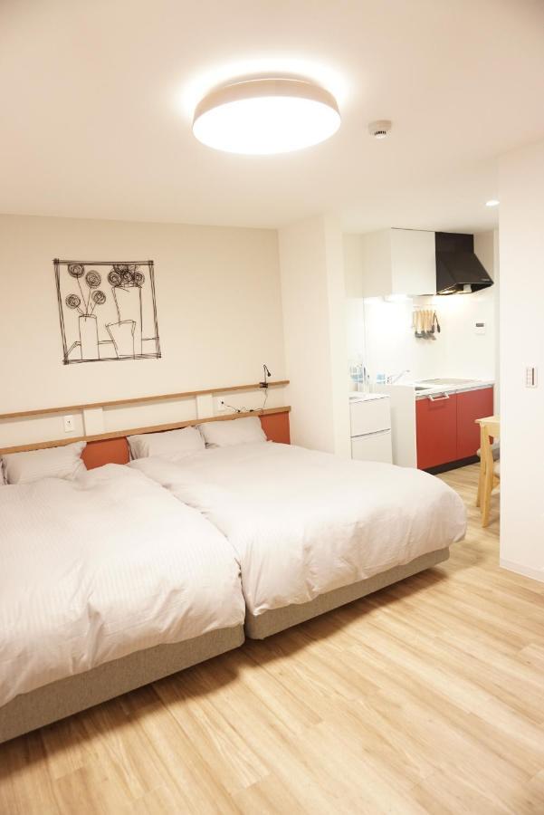 Sakura Shigure Shin-Osaka Apartment Bagian luar foto